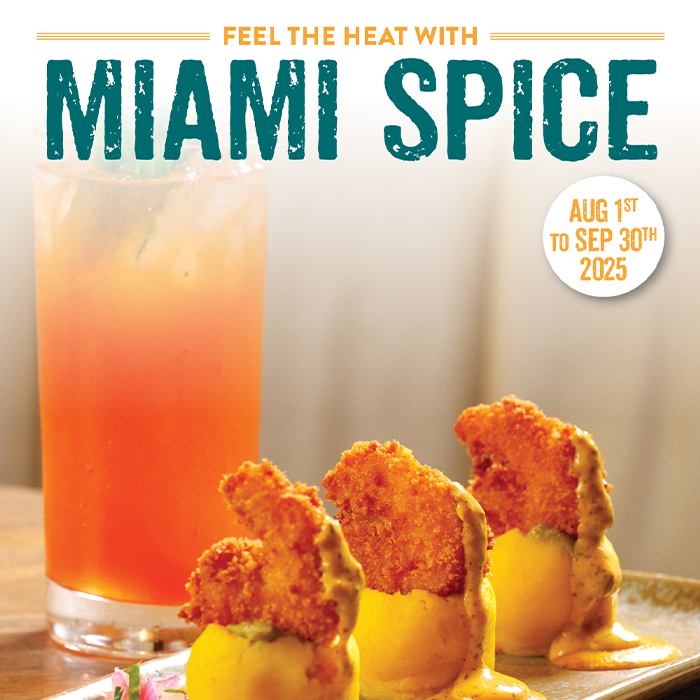 Crispy shrimp over yellow potato with creamy sauce and a tropical cocktail at Pisco y Nazca, promoting Miami Spice 2025.