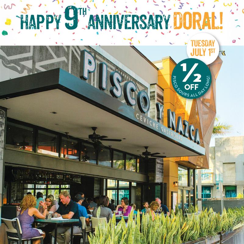 Outdoor view of Pisco y Nazca Doral with guests dining on the patio, celebrating the restaurant's 9th anniversary with colorful confetti and promotional signage for half-off Pisco Sours.