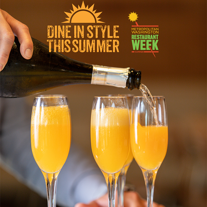 Mimosas being poured with ‘Dine In Style This Summer’ banner for Metropolitan Washington Restaurant Week.