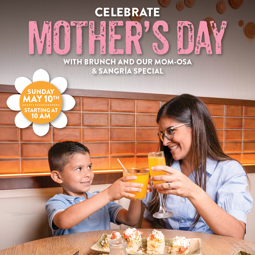 Mother and child toasting with mimosas at Pisco y Nazca while enjoying a Mother’s Day brunch promotion.